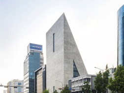 赫尔佐格与德梅隆韩国首作即将竣工，楔形体量如混凝土雕塑